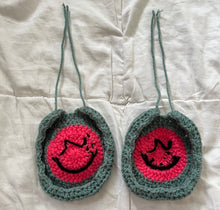 Load image into Gallery viewer, Pink and Green Crochet Smiley Face Headphone Cover
